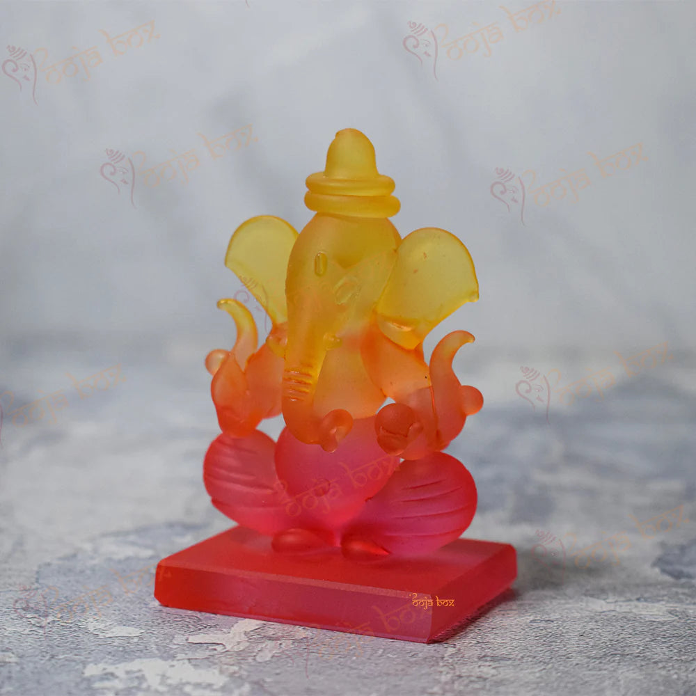 Car Ganesha Showpiece in Unheroic and Orange Double-Sided Crystal