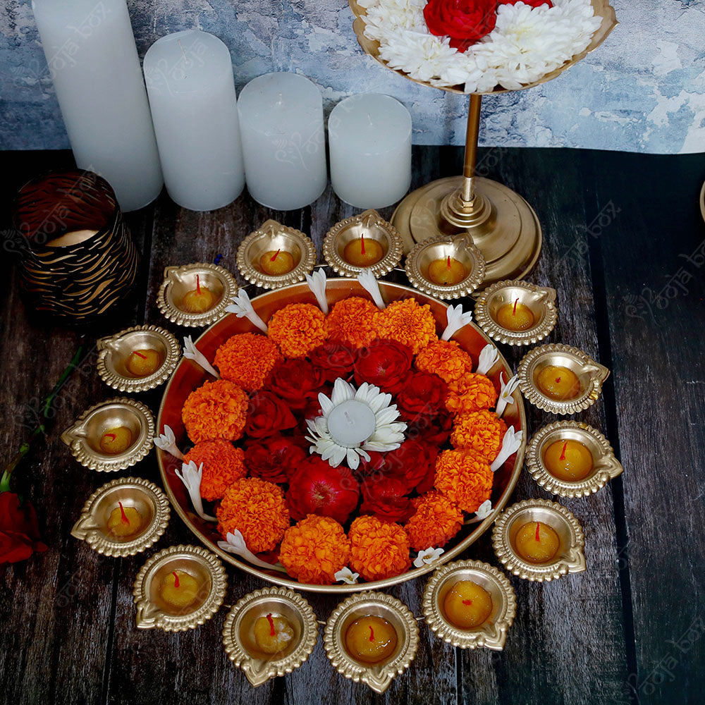 Traditional Peacock Diya With Floral Urli