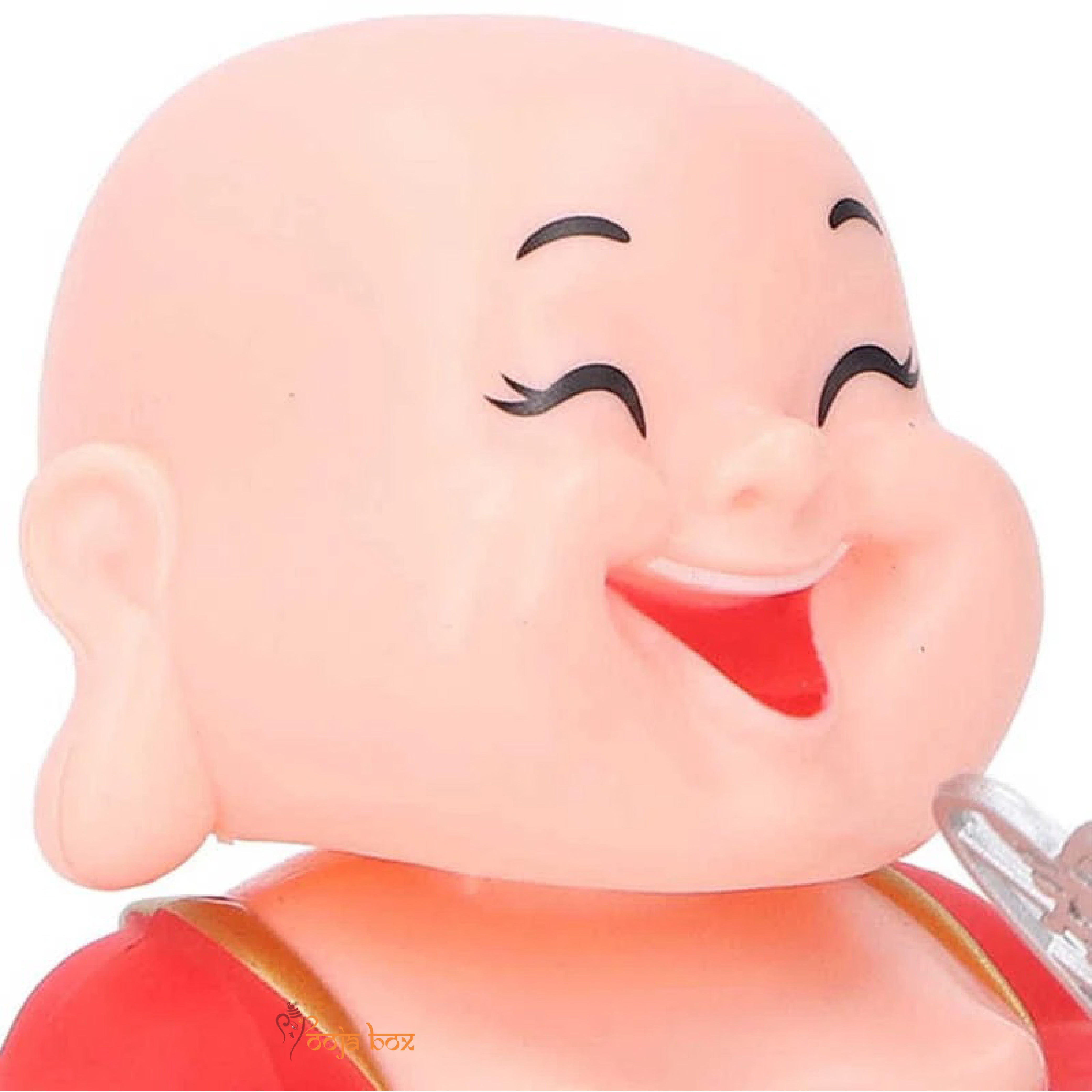 The "Ritualistic Monk" laughing Buddha holding a money bag